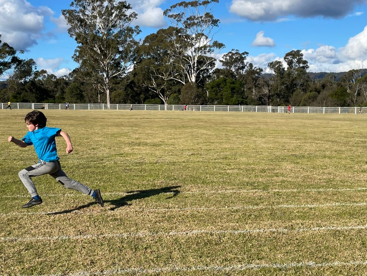 young male running fast